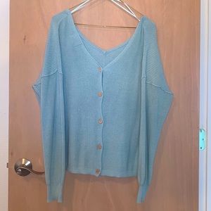 Off the shoulder knit/woven sweater. Button down